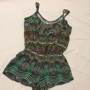 Patterned romper with ruffled neckline